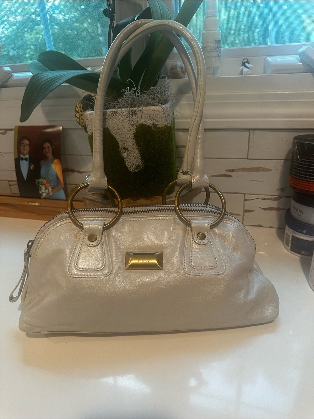 Oatmeal/off white color all Leather Bag with brass Hardware